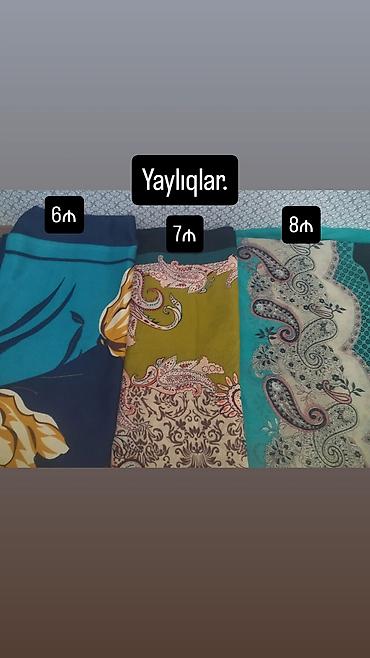 Baş geyimləri: Tünd qəhvəyi rəngli, müxtəlif naxışlarla bəzədilmiş yaylıq. Yaylığın — 8