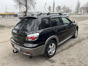 Mitsubishi: Mitsubishi Outlander: 2005 г., 2.4 л, Автомат, Газ, Универсал — 1