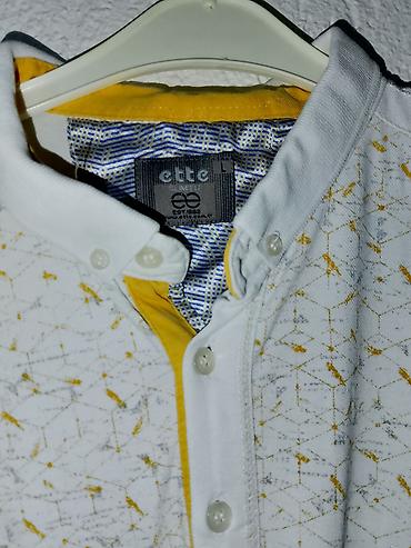 Majice: Muške polo majice – 2 komada Svaka majca po 600dinara 1) Infinity Man — 16