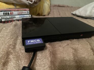 redmi note 13 256 gb qiymeti: PlayStation 2 Slim oyun konsolu dəsti Komplekt: - PS2 Slim konsolu -