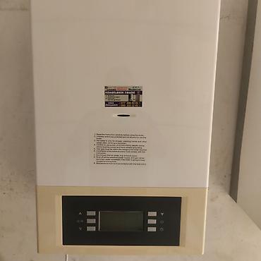 Kombi 28 kw tam işlək vəziyyətdə 1 il zəmanət verilir