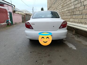 фольксваген поло новый кузов комплектации и цены: Kia Rio sedan – ağ rəng - Kuzov: 4 qapılı sedan, ağ rəng, arxa “Rio”