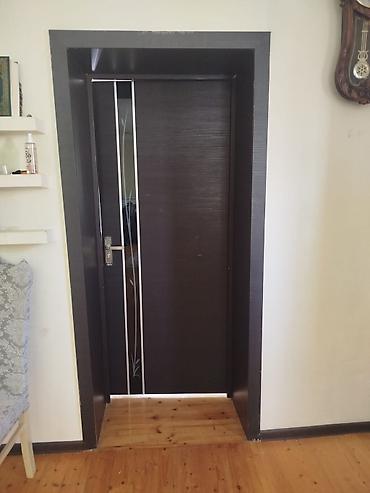 ayna qapi: Daxili sürgülü qapı sistemi - Material: tünd rəngli MDF/laminat — 2