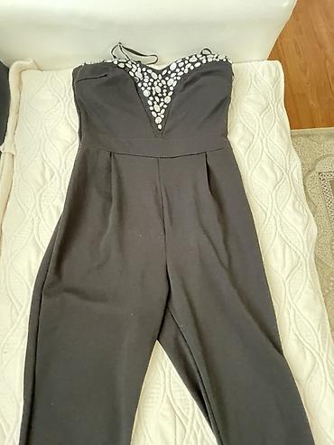 helanke 116: Elegantni crni ženski kombinezon bez rukava. Gornji deo je korset — 2