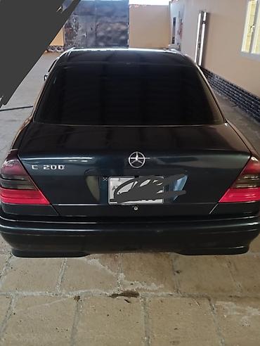 disk 14: Mercedes-Benz C 200: 2 l | 1999 il Sedan — 2