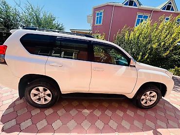 фольксваген поло л с: Toyota Land Cruiser Prado, ağ rəng, 5 qapı, tam ölçülü SUV — 4