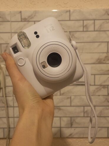 телефон редми нот 12: Camera Instax 12 mini. Он абсолютно новый,пользовалась ради