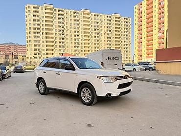 Mitsubishi: Mitsubishi Outlander – ağ rəngli, şəhər və uzun yol üçün rahat və — 8