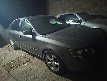 maşın 09: Hyundai Sonata: 3.3 l | 2005 il Sedan — 2