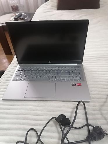 HP: HP laptop 15.6" – AMD Ryzen - Brend: HP (logo na poklopcu i ispod — 3