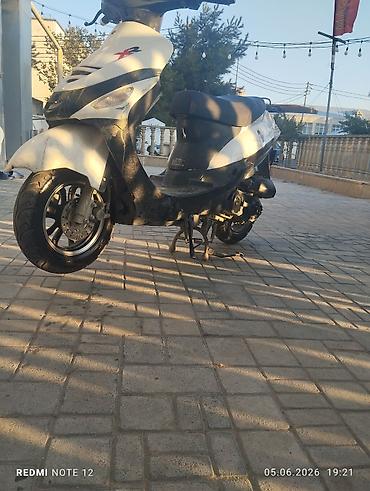 elektrikli scooter en ucuz: Skuter – şəhər içi gediş‑gəliş və çatdırılma üçün praktik model - — 1