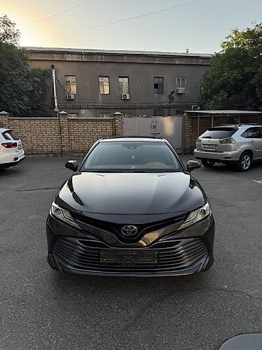 byd e2 2025: Toyota Camry: 2018 г., 2.5 л, Вариатор, Гибрид, Седан — 2