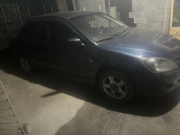 пороги форестер: Mitsubishi Lancer: 2005 г., Автомат, Бензин, Седан