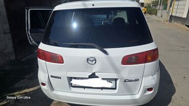 мазда фамилия запчасти: Багажниктин капкагы Mazda, 2003 г., Оригинал