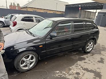 maxda demio: Mazda 323: 2001 г., Механика, Бензин, Хэтчбэк — 3