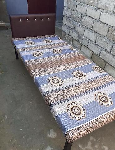 Kravat 
Taza