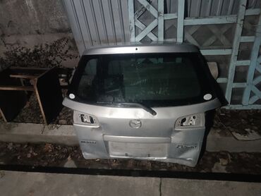 Другие детали кузова: Мазда Демио 2004 до рестайлинг кузовные детали 1.Экран (телевизор) — 3