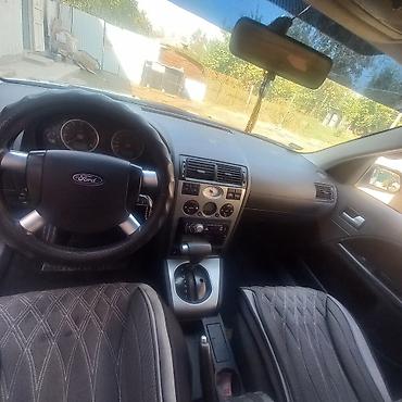 ман радиятор: Ford Mondeo: 2002 г., 2 л, Автомат, Бензин, Универсал — 8