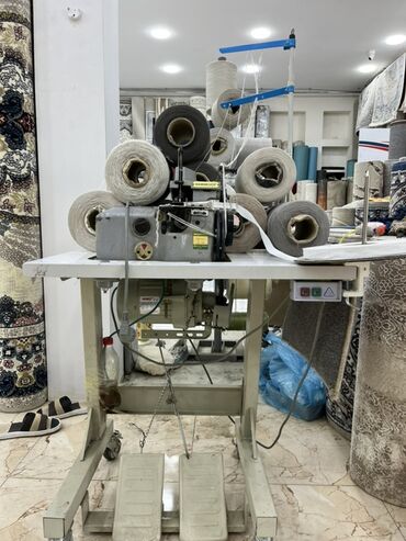 Digər istehsal avadanlığı: Xalça kənarı vurma (overlok) avadanlığı və iri həcimli sap bobinləri — 9