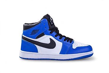 bele nike patike: Nike Air Jordan 1 Mid – plavo/belo/crno - Silueta: klasični high-top — 2