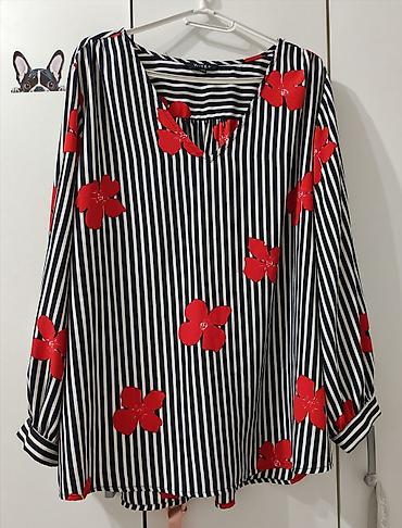 defender pantalone: Ženska bluza brenda **Wite+**, u veličini **44**. Model je izrađen u — 1
