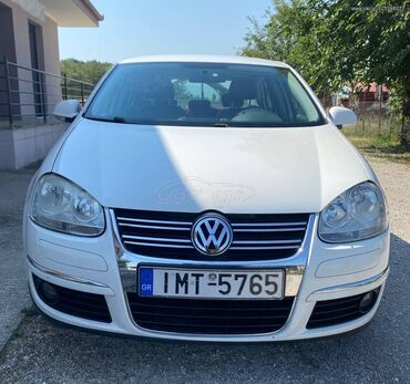 Volkswagen Jetta: 1.6 l | 2011 year Limousine