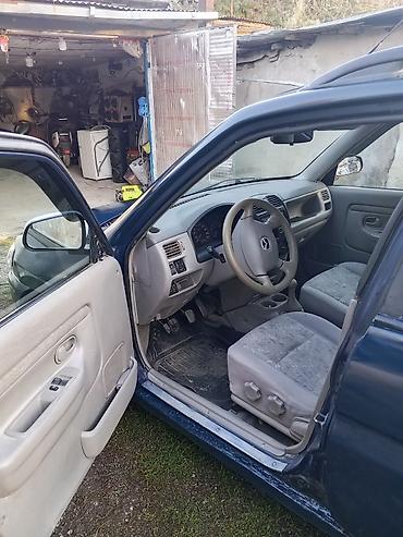 дом в колесах: Mazda Demio: 2000 г., 1.3 л, Механика, Бензин, Универсал — 5