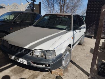 Mazda: Mazda 323: 1988 г., 1.4 л, Механика, Бензин, Хэтчбэк