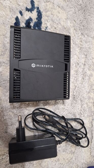 роутер sim: Продам Микротик RouterBoard hAP ax2 (C52iG-5HaxD2HaxD-TC