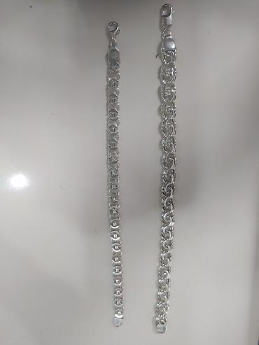 Gümüş qolbaq tek tek - Material: parlaq gümüş rəngli metal ərintisi -