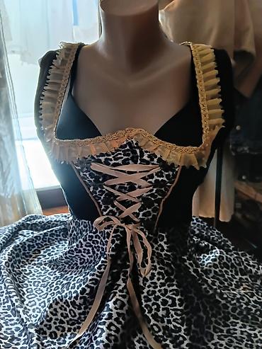 Haljine: Haljina s leopard printom i korset vezivanjem - Model: midi haljina — 6