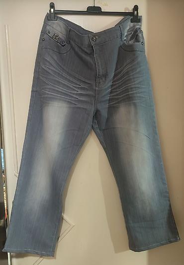 bele ženske pantalone: Ženske farmerke u svetlosivoj / ispranoj denim nijansi, sa blagim — 1