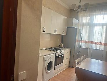 7 mərtəbə: Yasamal asan Xidmetin Arxasinda Mida yasayış kompleksinde ƏLA — 9
