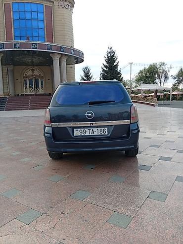 фургоны категории б: Opel Astra H Caravan (universal kuzov) - Kuzov: universal, 5 qapı - — 7
