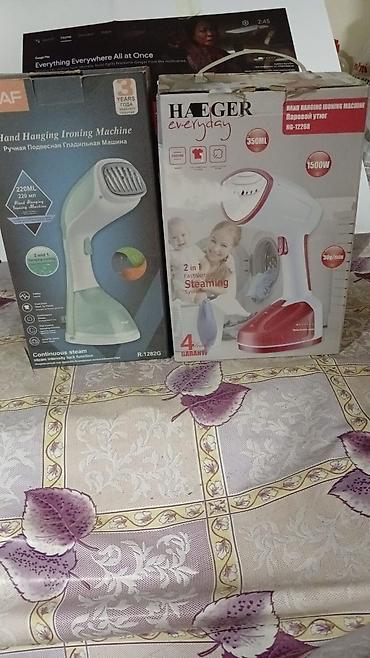 haeger: Məhsul: Əl üçün buxarlı ütülər (Hand Hanging Ironing Machine) - — 1