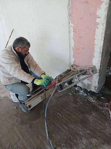 Digər tikinti xidmətləri: Dəmir-beton və kərpic divarlarda qapı-pəncərə açılışlarının kəsilməsi — 18