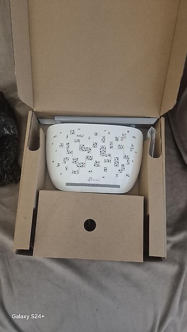 eve kamera sistemi: TP-Link Wi‑Fi marşrutlayıcı Xüsusiyyətlər: - 2 ədəd yüksək qazanclı — 2