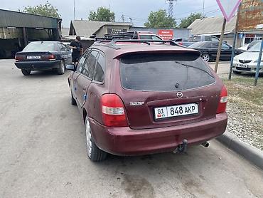 mazda 2000: Mazda 323: 2001 г., 1.6 л, Механика, Бензин, Универсал — 3