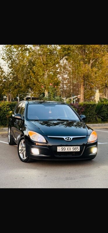 Hyundai: Hyundai i30, qara rəng, 5 qapılı hatchback. Mühərrik və yürüş - CRDi — 15