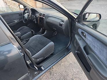 12 t: Mazda 626: 1997 г., 1.8 л, Механика, Бензин, Седан — 8
