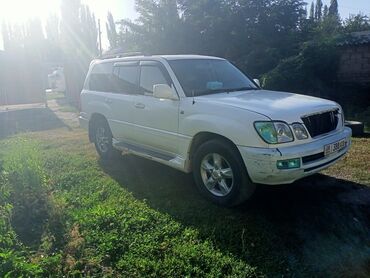 продаю номер авто: Lexus LX 470 (100 серия), белый, кузов SUV. Особенности и оснащение