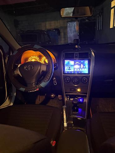 toyota aygo: Toyota Corolla (E140), ağ rəng, sedan gövdə. Xarici: - Orijinal — 5