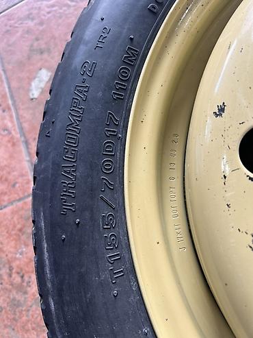 14р шина: Докатка (запасное колесо в сборе) - Шина: Bridgestone T145/70D17 110M — 2