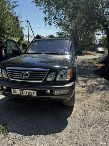 l 470: Мощный внедорожник Lexus LX 470 черного цвета с полным приводом