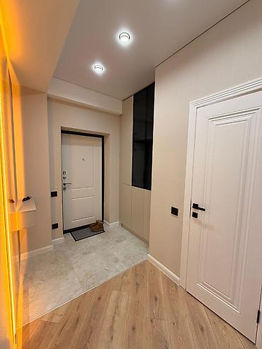 Ремонт под ключ: Современная квартира с дизайнерской отделкой - Продуманная прихожая — 1