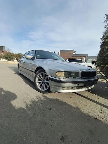 bmw f10 lip: BMW 7 Series sedan (E38), gümüş rəngli, 4 qapılı, arxa ötürücülü — 2