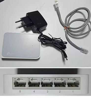 Модемы и сетевое оборудование: Коммутатор 5 портовый TP-Link TL-SF1005D 5-port switch (5utp 100mbps) — 1