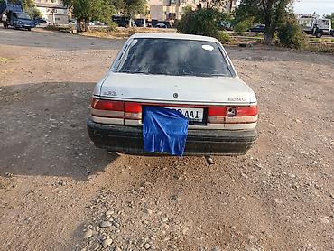 банпер саната: Mazda 626: 1989 г., Кол менен иштөөчү, Седан — 3