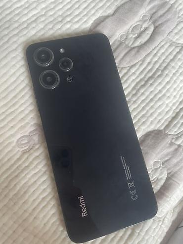redmi a3: Смартфон Xiaomi Redmi 12 (черный) - Экран: 6.79" с центральным — 2