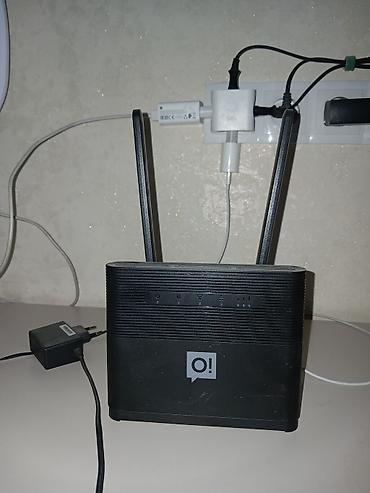 wifi роутеры: Wi‑Fi роутер с двумя внешними антеннами - Брендинг: логотип «O!» на — 1